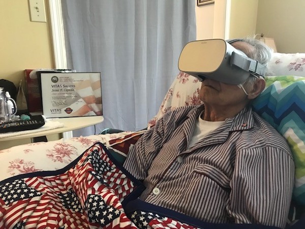 Navy veteran Jesus Cepeda takes part in a Virtual Honor Flight