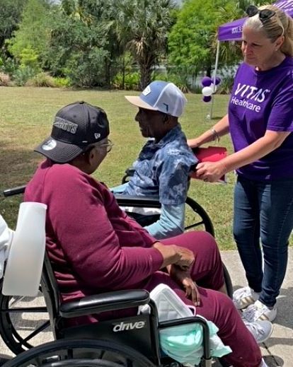 VITAS patient JC Payne greets his wife as she arrives for the special trip